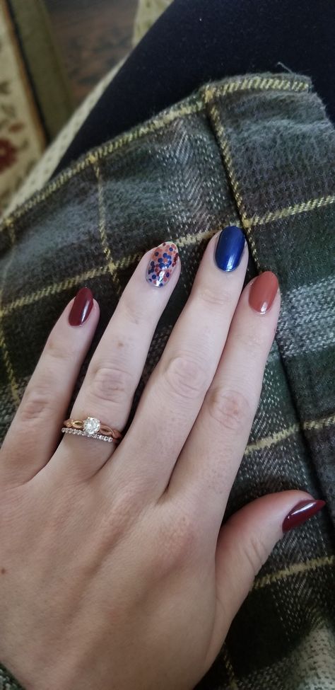 Blue, brown, maroon, 70s vibes, floral, accent nail Burgundy And Navy Nails, Fall Floral Nails, Navy Nails, Accent Nail, 70s Vibes, Accent Nails, Floral Nails, Fall Floral, Blue Brown