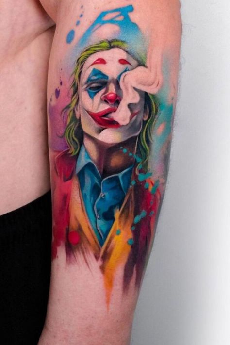 "Get inspired by these edgy joker tattoos that showcase the sinister charm of the character. Perfect as hand joker tattoos, each design offers unique tattoo ideas." Joker Tatoos Ideas, Tato Joker, Baroque Tattoo, Joker Tattoos, Joker Tattoo Design, Colored Tattoo, Colored Tattoo Design, Realistic Tattoo Sleeve, Clown Tattoo