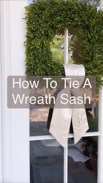 Fig & Dove on Instagram: "FAQ: How do you tie a wreath sash? 🤔 Today, we’re answering one of our most frequently asked questions. Hit the SAVE button + follow these simple steps when you tie your sash. Don’t forget to take a photo of your finished front door and tag us. Happy tying! #wreath #wreathsash #frontdoordecor #frontporch #bevelolighting #inspiration #decorinspo #summerdecor #exteriordesign #exterior #outdoorliving #interiordesigner #howto #styleinspo #classic #traditional #businessown Simple Ribbon On Wreath, Classic Outside Christmas Decor, Wreaths On House Exterior, Wreaths For Living Room Wall, How To Tie Sash On Wreath, Door Sash Ideas, Front Door Wreath Christmas, Square Boxwood Wreath, How To Make A Sash For A Wreath