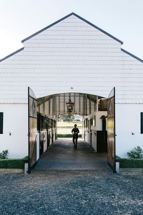 Horse rider Meaghan Willis' dream was to own a property that would allow her to live close to her horses. That was exactly what she found at Jimsbury Park at Hanging Rock, Victoria. It is where she has created a formal country garden and her dream stables. Luxury Horse Barns, Dream Barn Stables, Country Garden Design, Horse Barn Ideas Stables, Horse Barn Designs, Hanging Rock, Dream Stables, Dream Horse Barns, Horse Barn Plans