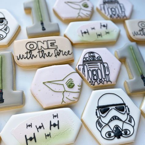 The Frosted Cookiery on Instagram: “O N E with the force. 🖤 tie fighter cookie design inspired by @steph.hancookies #firstbirthdaycookies #starwarsbirthday…” Star Wars 1st Birthday Cookies, Baby Yoda Cookies Decorated, Star Wars Cookies Decorated, Mandalorian Cookies, Baby Yoda First Birthday, One With The Force First Birthday, One With The Force Birthday, Star Wars Sugar Cookies, Baby Yoda Cookies