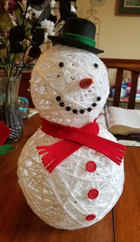 This darling little yarn snowman was made by Michelle Pickett…isn’t he cute?! She shares her tutorial with us today… “I used 2 balloons inflated. I then dipped white yarn into a Elmer’s glue mixed with a small amount of water. I ran the string through my fingers to remove some of the glue. I then … Yarn Snowman, Crafty Morning, Snowman Crafts Diy, Balloon Crafts, Diy Snowman, Snowman Crafts, Winter Crafts, Xmas Crafts, Christmas Crafts Diy