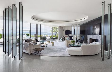 Open living area designed in a circular fashion and semi-enclosed by rotating glass panels in this home located in Hollywood Hills. [2000 × 1290] London Living Room, Midcentury Home, Ceiling Detail, Round Sofa, �아파트 인테리어, Curved Sofa, Decoration Inspiration, A Living Room, Furniture Design Modern