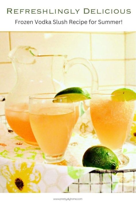 A closeup of two cocktail glasses filled with vodka slush.  You can see the icy coldness on the outside of each glass and there is a pitcher of vodka slush in the background. Vodka Slush Recipe, Vodka Slushies, How To Make Vodka, Vodka Slush, Grapefruit Vodka, Slushy Drinks, Slush Recipes, Slushie Recipe, Frozen Lemonade