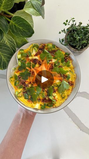 994K views · 34K reactions | Healthy rice paper egg wrap✨

▪️Avocado or Olive Oil▪️1 Rice Paper Sheet▪️2 Eggs▪️Salt & Pepper▪️1 Scallion, sliced▪️Chili Oil (optional)▪️Cilantro Leaves▪️Carrot, shaved with a vegetable peeler▪️

1️⃣ Beat eggs with a sprinkle of salt and pepper and set aside
2️⃣ Preheat a medium pan over medium heat and coat (or spray) lightly with oil
3️⃣ Add a dry rice paper sheet (textured side down) and then add the scallions on top of the rice paper sheet, arranging them so they’re distributed evenly
4️⃣ Pour the eggs in the middle of the rice paper sheet and then push them toward the perimeter with chopsticks or a spoon so they fill the sheet in one layer
5️⃣ Cook 1-2 mins until the eggs are almost set, then add chili oil to taste and cook for another 1-2 mins until egg Rice Paper Egg, Dairy Free Vegetable Recipes, Rice Paper Recipes, Korean Pancake, Egg Hacks, Asian Dish, Egg Wrap, Healthy Rice, Dry Rice