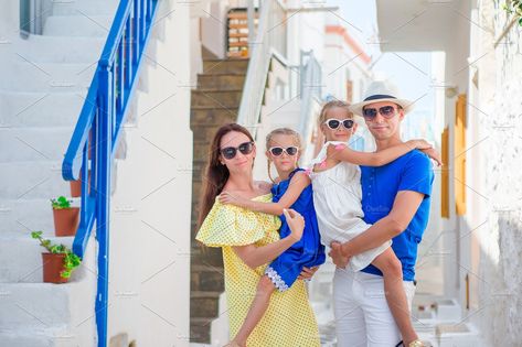 Family vacation in Europe. Parents and kids at street of typical greek traditional village with white walls and colorful doors on Mykonos Island, in Greece by travnikovstudio on @creativemarket Traveling To Greece, Greece With Kids, Colorful Doors, Ancient Athens, Mykonos Island, Tips For Traveling, Family Tour, Greece Vacation, Greece Holiday