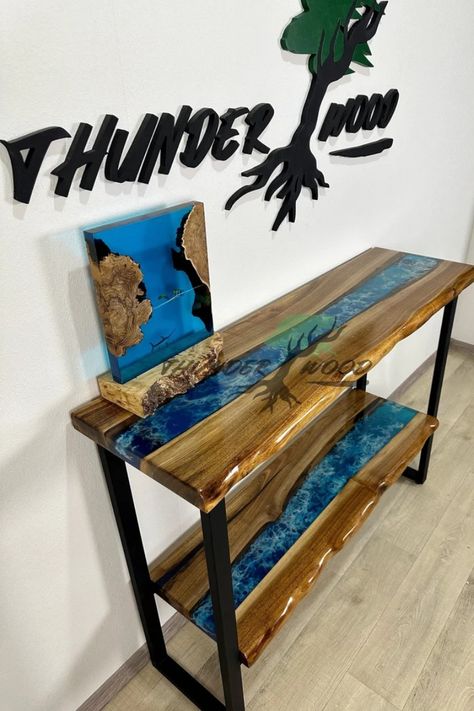 Here at ThunderWoodStudio we don’t make boring furniture using typical designs, we make a statement! This custom-made Console Table has a modern luxury look and will give special emphasis to your home. If you like unique furniture, our epoxy river table is exactly what you’re looking for! Wood Farmhouse Table, Shelf Console Table, Console Table Narrow, Ffa Ideas, Console Table With Shelf, Breakfast Bar Table, Shelf Console, Narrow Entryway Table, Furniture Concept