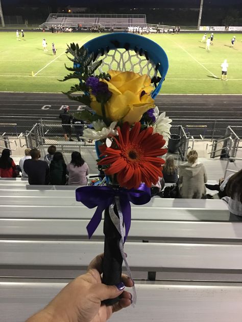 Lacrosse Bouquets for Senior Moms on Senior Night Lacrosse sticks were purchased at Academy Sports in the pool toys section Lacrosse Team Party Ideas, Lacrosse Stick Flower Bouquet, Senior Day Decorations Sports, Lacrosse Bouquet, Lacrosse Senior Night Gifts, Lacrosse Graduation Party Ideas, Senior Night Flowers For Mom, Lacrosse Senior Night Posters, Senior Night Gift Ideas Lacrosse