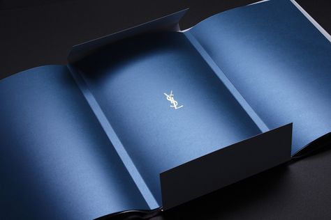 Yves Saint Laurent branding by Studio Marianne Guély branding Presentation Folders, Princess Yachts, Presentation Folder, Folder Design, 카드 디자인, Grafic Design, Retail Design Blog, Packing Design, Corporate Design