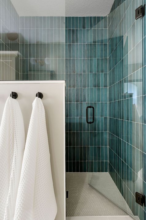 Vertical Subway Tile Bathroom Black Grout, Shower Tiles Vertical Or Horizontal, Blue Green Subway Tile Bathroom, Vertical Metro Tiles Bathroom, Vertical Tile Shower Ideas With Tub, Staggered Vertical Subway Tile, Vertical Straight Stack Shower Tile, Teal Shower Tile Bathroom, Dark Blue Subway Tile Bathroom