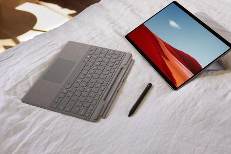 Microsoft has updated its Windows 10 on ARM based Surface Pro X. With Apple set to launch its own ARM-powered MacBook, who has the advantage in this new frontier? Surface Pro Aesthetic, New Surface Pro, Apple Set, Basement Room, Laptop Gadgets, Windows Surface, Digital Writing, Pen On Paper, Setup Ideas