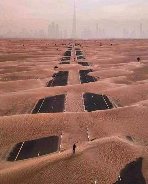 Mission Implausible on Twitter: "A photograph of a highway leading to downtown in Dubai — two months into the global pandemic.  It’s like a Pink Floyd album cover.  https://t.co/P4x5lGLGMe… https://t.co/UoBqa3c6CD" Desert Apocalypse, Avant Apocalypse, Pink Floyd Album Covers, Pink Floyd Albums, Sand Storm, Dystopian World, Matte Painting, Mad Max, Maze Runner