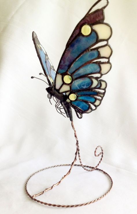 Butterfly sculpture.  Hand-casted body, wire details, twisted wire stand. Stained Glass Sculpture Mixed Media, Butterfly Sculpture, Wire Butterfly, Stained Glass Birds, Interior Design Sketches, Stained Glass Butterfly, Stained Glass Decor, Glass Butterfly, Stained Glass Designs