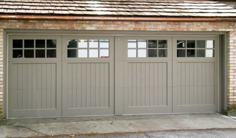 Wooden Garage Doors in Northfield, IL | Raynor Garage Door Brick House, Garage Door On Brick House, Cape Cod Garage Doors, Stained Garage Doors, English Cottage Garage, Farmhouse Garage Door, Wooden Garage Door, Garage Doors Wood, Traditional Garage Doors