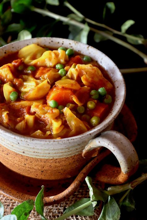 Vegetarian Cabbage Stew with Turmeric is as hearty as stew with meat, and as delicious as can be! Cooking with fresh turmeric is the key, and it's packed with tender vegetables in a rich blend of spices and tomatoes -- you will devour every last bite! #cabbage #turmeric #stew #vegan #vegetarian #tomato Best Artichoke Recipe, Stew Vegan, Breakfast Tacos Recipe, Fresh Turmeric Root, Cabbage Stew, Italian Chicken Sausage, Vegan Stew, Ultimate Breakfast, Artichoke Recipes