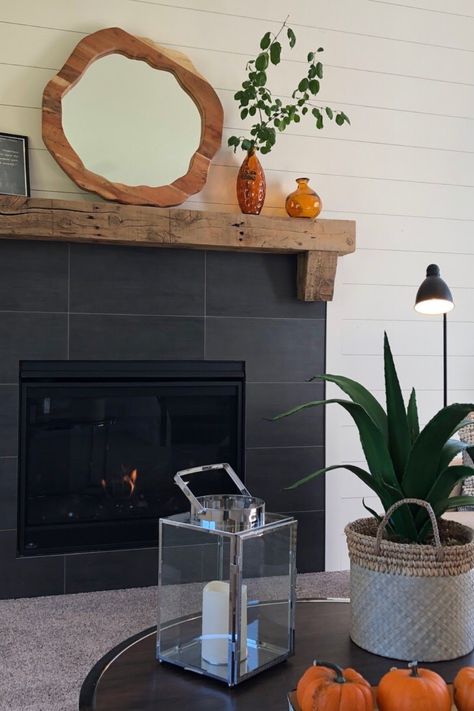 Black Matte Tile Fireplace, Simple Fireplace Tile Ideas, Black Tile Wood Stove, Shiplap Over Tile Fireplace, Black Tile And Shiplap Fireplace, Dark Tiled Fireplace, Black White And Wood Fireplace, Simple Tile Fireplace, Tiled Fireplace With Wood Mantle