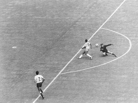 This image is simple and clean. It's Pelé fooling the Uruguay goalkeeper with the so-called 'runaround move' at the 1970 World Cup. Imagine how much more celebrated it would be if he'd actually scored. It could be as loved as the shot of him wearing a sombrero at Mexico's Azteca Stadium after victory in 1970 1970 World Cup, Marco Van Basten, 1966 World Cup, Action Images, Football Photography, Fc Chelsea, European Soccer, Picture Editor, Olympic Athletes