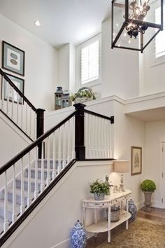 Plant Ledge Design, Pictures, Remodel, Decor and Ideas - page 5 Plant Ledge Decorating, Tall Foyer, Banister Remodel, Plant Ledge, Ledge Decor, Stairs Window, Traditional Staircase, Foyer Decor, Foyer Decorating