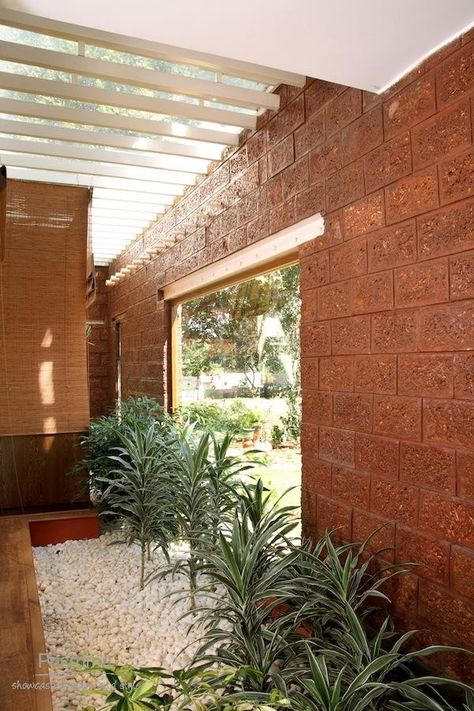 Laterite Stone House Interior, Puja Wall Design, Laterite Stone House, Laterite Cladding, Goa Houses, Laterite Stone, Cladding Tiles, Wall Cladding Tiles, Wood Siding Exterior