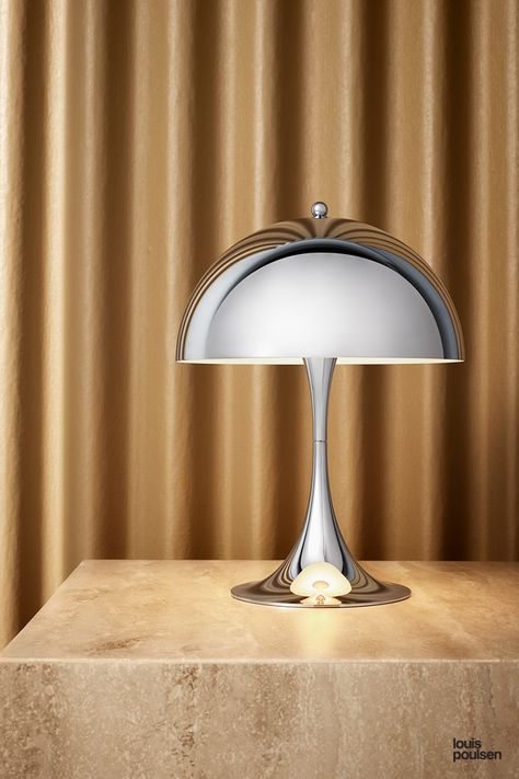 PH 5 • A new chrome edition of Verner Panton’s head-turning sculptural lamp enters the scene, reflecting its surroundings and enlivening even the smallest nooks with its gleaming, elegant new profile. • #louispoulsen #danishdesign #scandinaviandesign #light #lighting #interior #interiordesignproject #licht #beleuchtung #interieur Verner Panton Lamp, Panthella Lamp, Panthella Mini, Louis Poulsen Lighting, Blitz Design, Mini Table Lamps, Table Led, Mini Lamp, Verner Panton