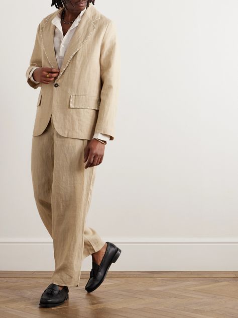 Kartik Research founder Kartik Kumra celebrates his Indian heritage through honouring craft traditions. Handloomed by weavers in Rajasthan, this suit jacket is cut from linen, sourced from local Himalayan organisations, and embellished with floral-inspired faux pearls along the notch lapels and flap pockets. Responsible Craftsmanship. This product promotes artisanal skill and brands that invest in communities and adhere to fair-trade principles. Find out more about our Consciously Crafted crite… Non Suit Groom Attire, Brown Linen Suit Wedding, Linen Wedding Suit, Linen Suit Men, Mens Linen Suit, Linen Suits For Men, Khaki Suit, Formal Dresses For Men, Man Wedding