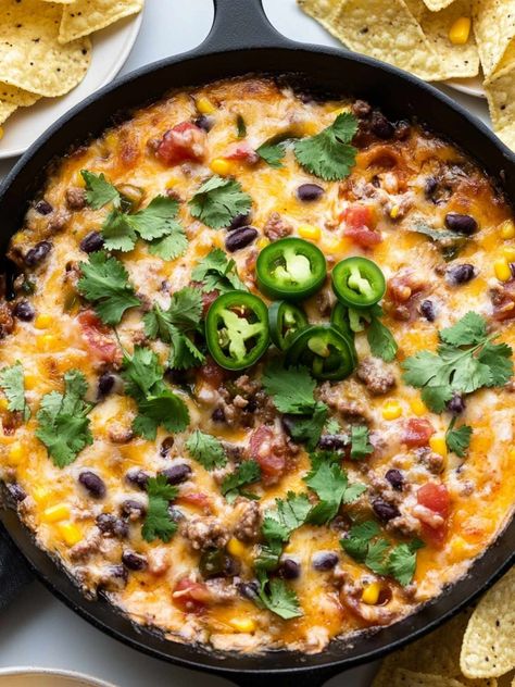 This cheesy taco dip is bubbly, loaded with seasoned ground beef, melted cheese, and always a hit whenever I make it. Cheesy Taco Dip, Creamy Chicken Enchilada Soup, Beef Appetizers, Baked Appetizers, Seasoned Ground Beef, Beef Dip, New Years Appetizers, Creamy Chicken Enchiladas, Mexican Beef