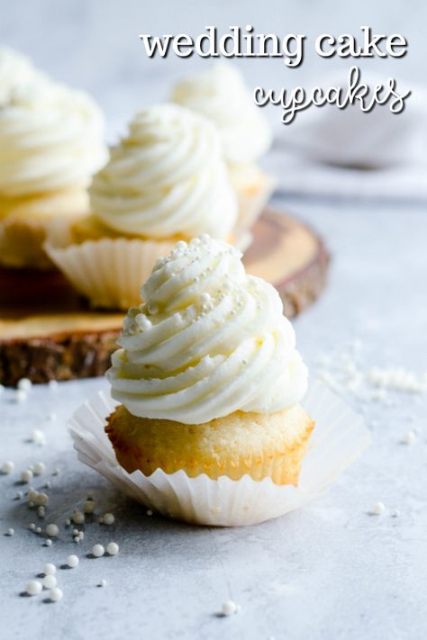 These wedding cake cupcakes are so good, you won't want to save them for weddings only. Make these moist, fluffy cupcakes with whipped buttercream any time! Wedding Cake Cupcakes Recipe, White Wedding Cake Cupcakes, Wedding Cupcake Recipes, Wedding Cake Cupcakes, Whipped Buttercream, Fluffy Cupcakes, Food Cupcakes, Cupcakes Recipes, Wedding Cake Recipe