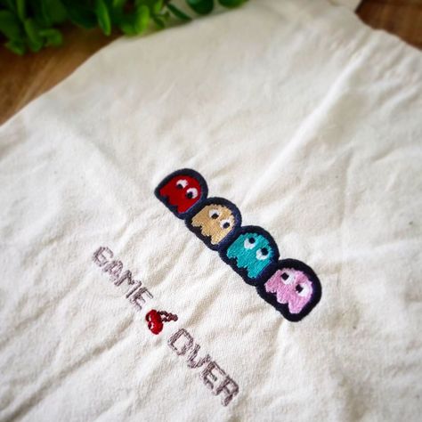 🎮 Level up your style with our custom tote bags! ��🌟 Hand-stitched with iconic designs like this retro Pac-Man theme. Perfect for gamers and vintage lovers alike. Make a statement and carry your own custom icons. 🛍️👾 #customtotebag #pacman #handmade #retrogaming #embroidery #gameover #shoplocal #smallbusiness #peronlisedclothing #customdesign #comingsoon #nostalgia Vintage Lovers, Custom Tote Bags, Custom Icons, Pac Man, Vintage Lover, Retro Gaming, Custom Tote, Level Up, Hand Stitched