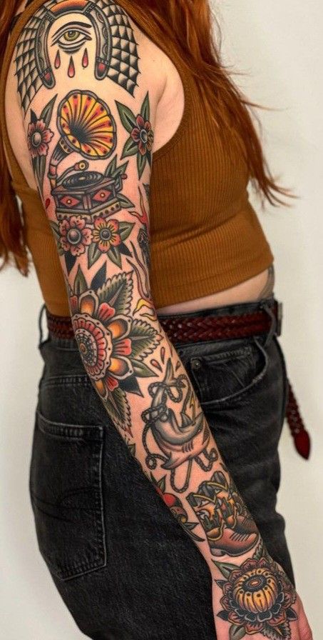 American Style Sleeve Tattoo, American Traditional Tattoos Arm Sleeve, Neotraditional Patchwork Tattoo, 444 Traditional Tattoo, American Traditional Lilly Tattoo, Traditional Style Filler Tattoo, Old School Sleeve Women, Women Chest Tattoo Traditional, Traditional Tattoo Arm Sleeve Women