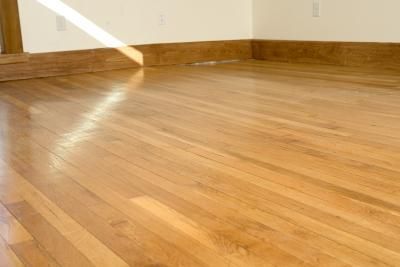 Which Direction Should Wood Floors Run? thumbnail Types Of Hardwood Floors, Remove Water Stains, Types Of Wood Flooring, Installing Hardwood Floors, Wood Floors Wide Plank, Oak Hardwood Flooring, Wood Laminate Flooring, Oak Hardwood, Engineered Hardwood Flooring