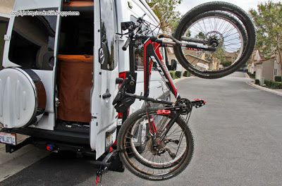 Roadtrek Modifications/ Mods, Upgrades, and Gadgets.: DIY Hitch Mounted Vertical Bike Rack/ Cargo Carrier that Does Not Interfere with the Rear Spare Tire Roadtrek Modifications, Tire Diy, Bedroom Light Shades, Diy Bike Rack, Vertical Bike Rack, Rear Bike Rack, Hitch Bike Rack, Bike Hitch, Vertical Bike