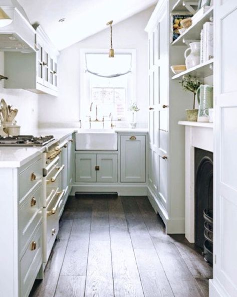 Charming and tiny white French farmhouse cottage style galley kitchen with fireplace and farm sink. #whitefrench #cottagekitchens #tinykitchens #galleykitchen #countrykitchen White French Farmhouse, French Farmhouse Cottage, Kitchen With Fireplace, Country Bathroom Designs, Country French Farmhouse, French Farmhouse Kitchen, French Apartment, Galley Style Kitchen, Bespoke Kitchen