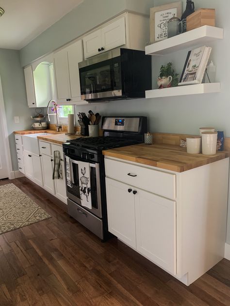 Galley Kitchen With Butcher Block Counters, White Cabinets With Butcher Block Top, Butcher Block Countertops White Cabinets, Kitchen With Butcher Block Counters, Countertop Stove, Small Condo Kitchen, White Cabinets White Countertops, Butcher Block Countertop, White Cupboards