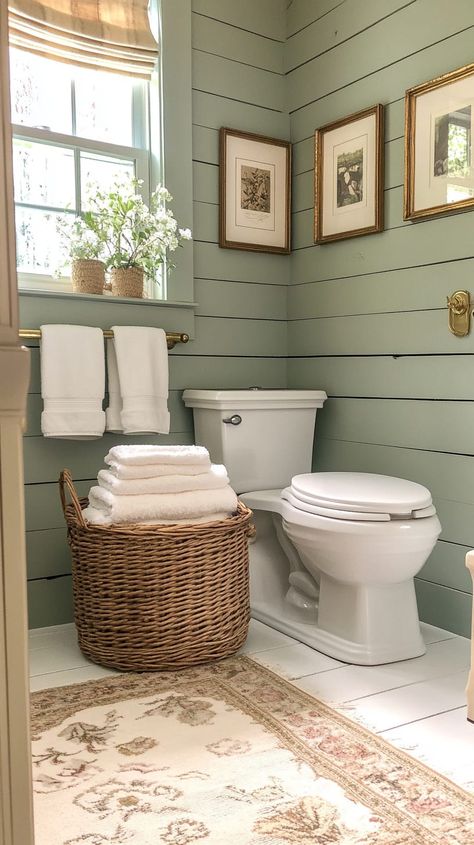 Small bathroom with white oak shiplap, vintage wicker basket, cream accents, and cottagecore decor in natural light. White Oak Shiplap, Oak Shiplap, Small Bathroom Solutions, Shiplap Walls, Vintage Wicker Baskets, Contemporary Color Palette, Bathroom Inspiration Modern, Framed Pictures, Fluffy Towels