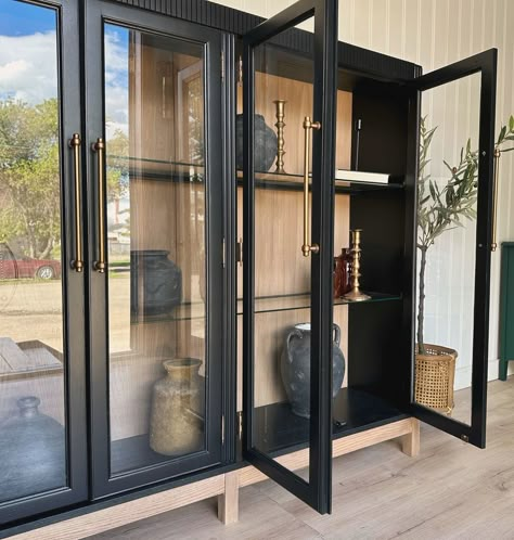 Finally, after a long while, I have a display cabinet😍 Black + lighter wood combo with a bit of texture and long, brass handles! Such a modern, classy combination 😍 || AVAILABLE || Be sure to swipe and see a “before” picture! Measures 59” W x 13” D x 52” H. Send a message for other details! Located in Elrose, SK. Delivery available Saskatchewan and Alberta wide. Winnipeg and Vancouver also available but will have to be scheduled. #blackcabinet #thecuratedattic #saskatchewan #saskatoo... Cabinet Living Room Storage, Painted Cabinets Living Room, Modern Display Cabinet, Display Cabinet Design, Display Cabinet Modern, Diy Furniture Restoration, Chalk Paint Furniture Diy, Black Cabinets, Furniture Rehab