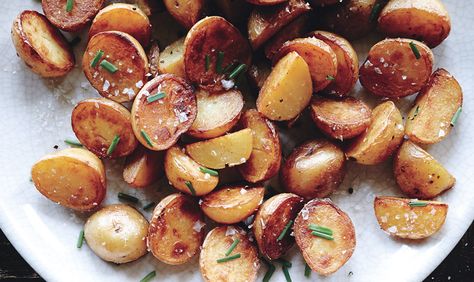 Cooking the potatoes in vinegar seasons them from within, and a final drizzle boosts the flavor. Vinegar Potatoes, Salt And Vinegar Potatoes, Best Roast Potatoes, Salt And Vinegar, Fresh Potato, Potato Dishes, Vegetable Sides, Roasted Potatoes, Potato Recipes