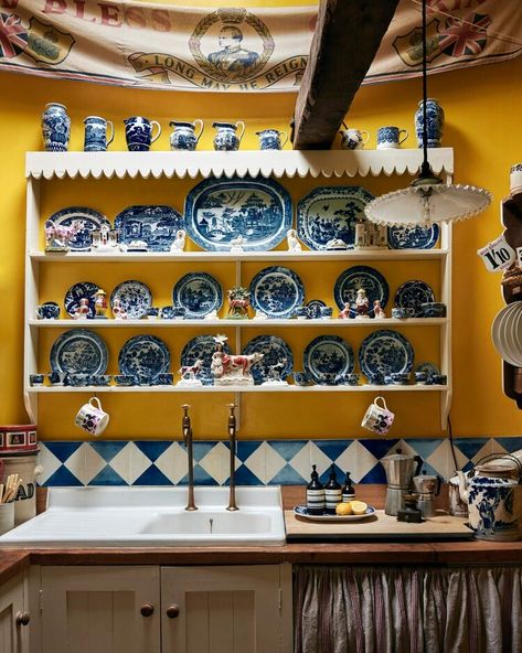 A Gardeners Bothy — John Tanner Interiors Blue Country Kitchen, Builtin Bookshelves, Yellow Kitchen Walls, Derelict House, Low Bookshelves, Country Life Magazine, Long Living Room, Built In Bed, Yellow Kitchen