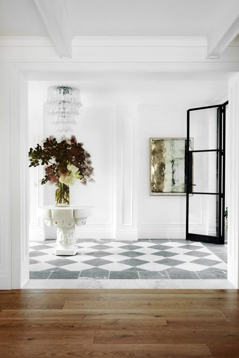 High-impact art transforms these rooms into something spectacular. Mosaic Tile Foyer, Checkered Tile Hallway, Modern Checkered Floor, Checkerboard Floor Foyer, Checkered Flooring Foyer, Marble Checkered Floor Entry, Black And White Tile Floor, Amber Lewis Kitchen, Wooden Entrance