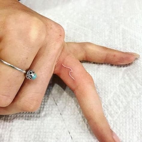 White Finger Tattoos, White Ink Tattoos, Tattoo Diy, Finger Tattoo For Women, Finger Tats, Wave Tattoo, Blackout Tattoo, White Ink Tattoo, Tiny Tattoo