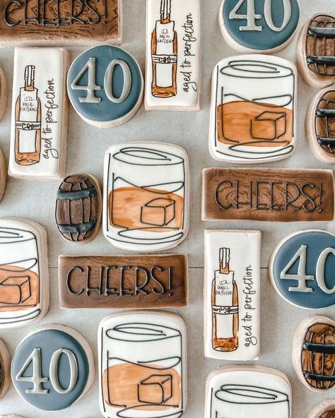 40th Birthday Custom Cookies. Collage of various shaped cookies, bourbon glass with icecube, barrel cookie, cheers cookie with wood background, bourbon bottle cookie with "aged to perfection" words, round "40" cookie.  Bourbon Country theme, bourbon cookies,  cheers to 40 years cookies, butter cookies, sugar cookies.  MH Cookie Shoppe #CookiesBringJoy Whiskey Bottle Cookies Decorated, Bourbon Themed Cookies Decorated, Bourbon Themed 40th Birthday Party, Bourbon Glass Cookies Decorated, 1983 Birthday Cookies, Cheers Themed Birthday Party, 21st Birthday Cookies Decorated For Guys, Whiskey Theme Cookies, Birthday Cookies Decorated Men 30