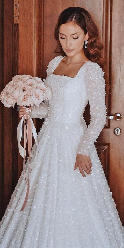 Long Sleeve Wedding Dress 2022, Modest Wedding Dresses Sparkle, Modest A Line Wedding Dress With Sleeves, Modest Wedding Dresses Square Neck, Modest Wedding Dresses Lds Long Sleeve, Modest Wedding Dresses A-line, Elegant Wedding Dresses With Sleeves, Modest Sparkly Wedding Dress, Pearl Wedding Dress Long Sleeve