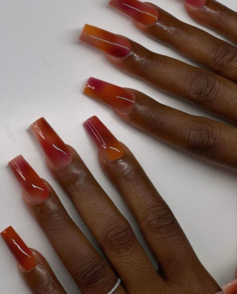 Auburn Acrylic Nails, Jelly Nail Designs Short, Aura Nails On Dark Skin, Cherry Red Nails Black Women, Birthday Nails Red And Gold, Transparent Orange Nails, Jelly Square Nails, Jelly Orange Nails, Red Orange Aura Nails