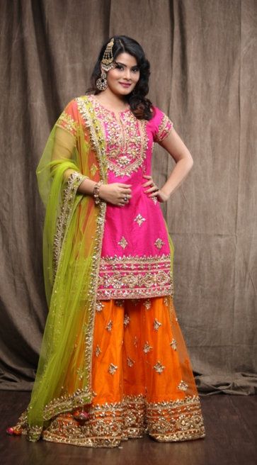 Pink And Orange Sharara, Orange Combination Dress, Orange Lehenga Color Combos, Orange Lehenga Colour Combinations, Contrast Lehenga Color Combos, Pink Orange Lehenga, Pink And Orange Lehenga, Orange Indian Outfit, Lehenga Color Combinations