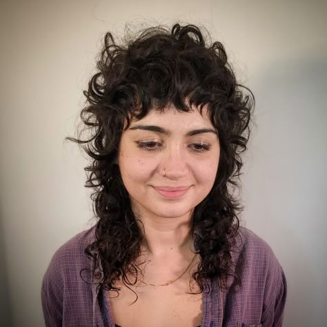 Nita Pita on Instagram: "Crown of curls I had so much fun with Ida today giving her a refreshed shag. Her curls are amazing and really make this haircut that much better. Styled with: @oribe Styling Butter & Curl Shaping Mousse #quethecurls #curlyshag #curls #curlygirl #curlyhair #razorhaircut #razorcut #shaghaircut #shag #curlspoppin #houstonhairdresser #houstonhair #houstonhairstylist #curlycut" Very Curly Shag Haircut, Curly Punk Hairstyles, Shag Mullet Curly Hair, Mullet Hairstyles, Curly Hair Fringe, Curly Shag, Curly Shag Haircut, Razored Haircuts, New Year Hairstyle