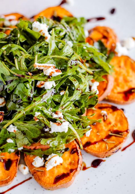 This easy, healthy Arugula Salad with Goat Cheese and Roasted Sweet Potato is perfect for Fall or Summer - any time of year of the year recipe! A simple balsamic glaze dressing adds a nice sweetness to the peppery arugula. Healthy Fall Sweet Potato Recipes, Kale Sweet Potato Goat Cheese Salad, Arugula Sweet Potato Salad, Sweet Potato Arugula Salad, Arugula Chickpea Salad Recipes, Recipe With Arugula, Sweet Potato Goat Cheese Salad, Kale Arugula Salad, Recipes Using Arugula