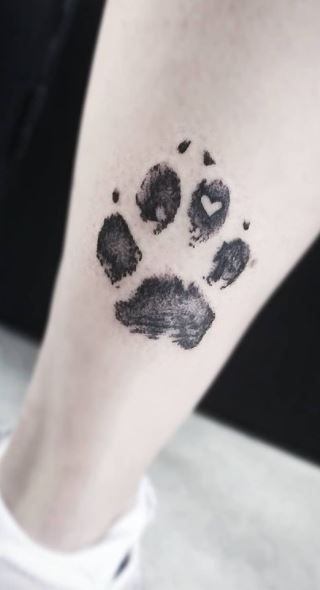 Husky Paw Print Tattoo, Paw Print Placement Tattoo, Creative Paw Print Tattoo, Tattoos With Paw Prints, 3d Paw Print Tattoo, Butterfly Paw Print Tattoo, Ink Paw Print Tattoo, Paw Print With Name Tattoo, Paw Print Initial Tattoo