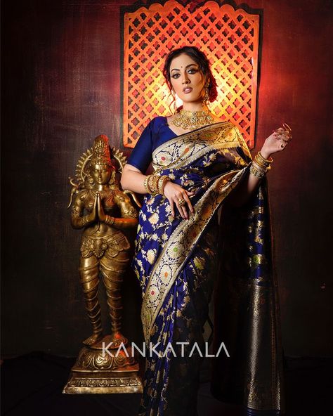 Aditi Sharma looks divine in Royal Blue Banarasi Silk Kadwa Jaal Saree from Navratri Special Daivatvam collection. The royal blue silk base radiates with a gold zari floral kadwa jaal and meenakari hints. The handpicked weave is woven in Banaras. The edition features 9 shades of divinity and on day 3 of Navratri Aditi represents goddess Chandraghanta draped in Royal Blue. #Daivatvam #9colorsofdivinity #mahagauri #festiveedition #navadurgaseries #weavesofindia Royal Blue Banarasi Saree, Goddess Chandraghanta, Blue Banarasi Saree, Saree Pins, Royal Blue Saree, Saree Ideas, Aditi Sharma, Simple Saree Designs, Bengali Bride