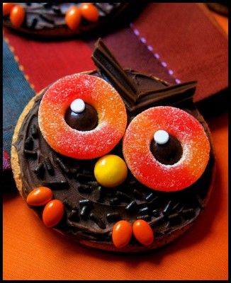 Wise Old Owls, Owl Cookies, Owls, Sugar Cookies, Chocolate Frosting, Chocolate Jimmies, Chocolate Twizzlers, Peach Rings, Reese's Pieces, Candied Sunflower Seeds, Kids, Party, Family-friendly Recipe, Edible Craft, Edible Owls, Wise, Wisdom, Fall, Autumn Owl Cakes, Spooky Halloween Treats, Owl Cookies, Edible Crafts, Owl Party, Vanilla Frosting, Chocolate Frosting, Holiday Treats, High Tea