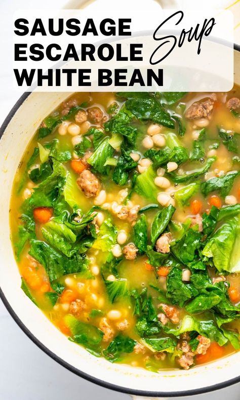 This easy Spring soup recipe makes a big pot to feed the whole family.   Use dried white beans with Italian sausage and hearty escarole lettuce to make this vibrant dish.  #springsouprecipes #whitebeansoup Pasta With Italian Chicken Sausage Escarole And Beans, Escarole Soup Italian, White Bean Escarole Soup, Escarole And Bean Soup With Sausage, Escarole Soup Recipes, Escarole And Beans With Sausage, Oven Carrots, Escarole And Bean Soup, Creamy Bean Soup