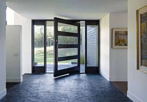 contemporary front door and stone floor in entryway Aluminium Glass Door, Entry Door Designs, Pivot Door, Construction Ideas, Modern Front Door, Pivot Doors, Front Entry Doors, Glass Front Door, Front Door Design